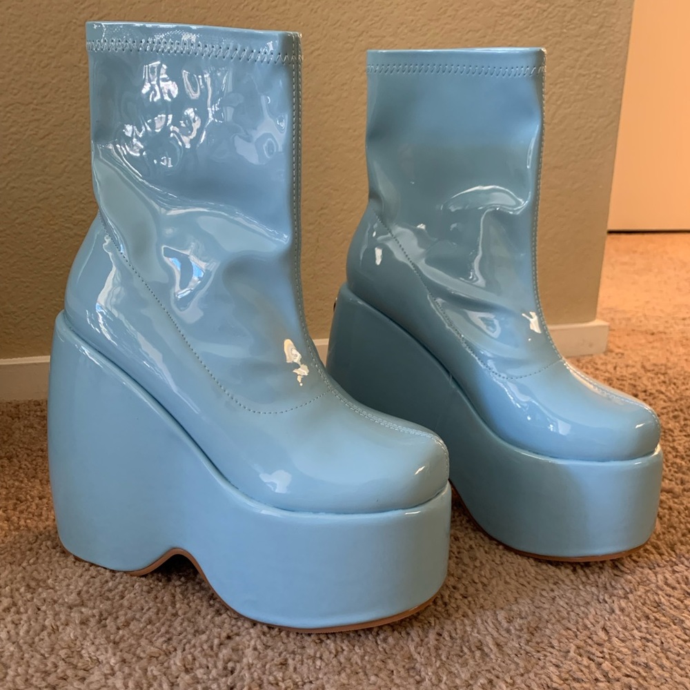 Dolls Kill aqua patent platform boots